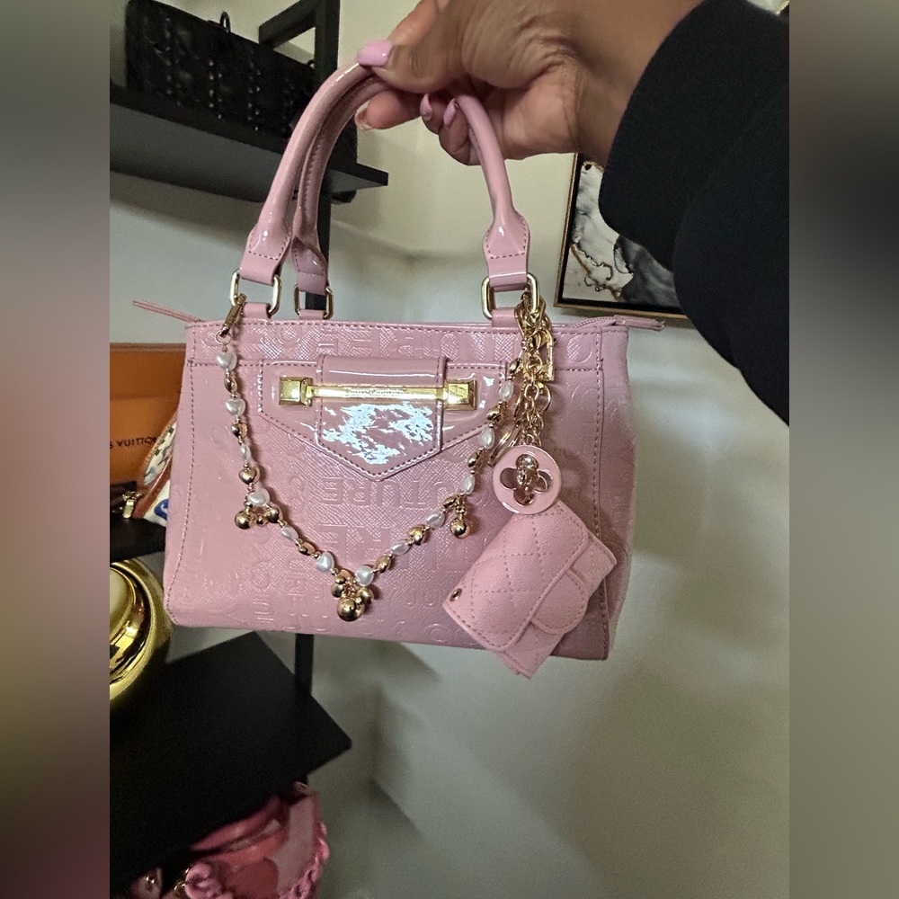 Juicy Couture on the block tfy satchel Word on the street